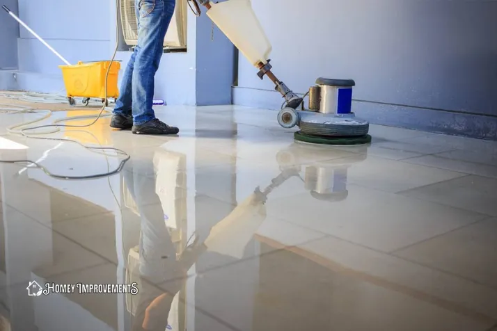 polish the surface of the marble floor