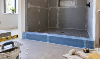 Waterproofed shower curb during a bathroom renovation