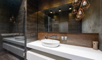 Modern bathroom with decorative overhead lighting